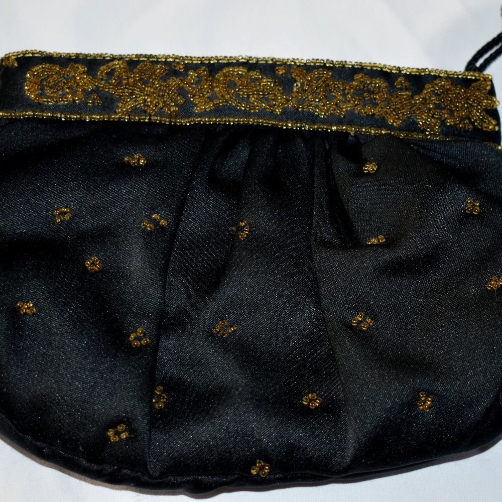 Genie Womens Small Evening Clutch With Gold Colored Beading.